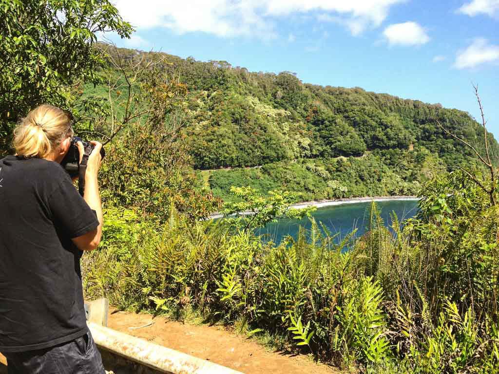 Road To Hana Visitor Photographing Cliffs Maui